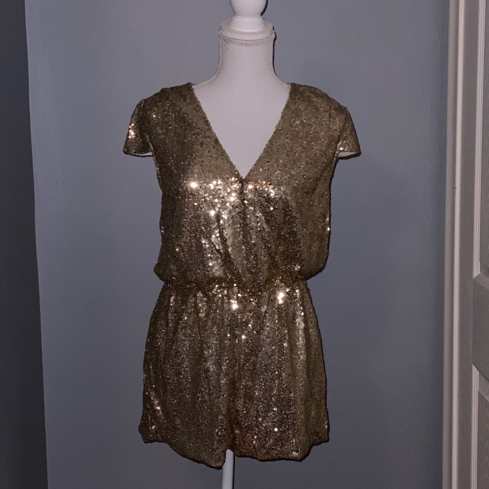 Gold sequence romper. Like new. Worn only once.